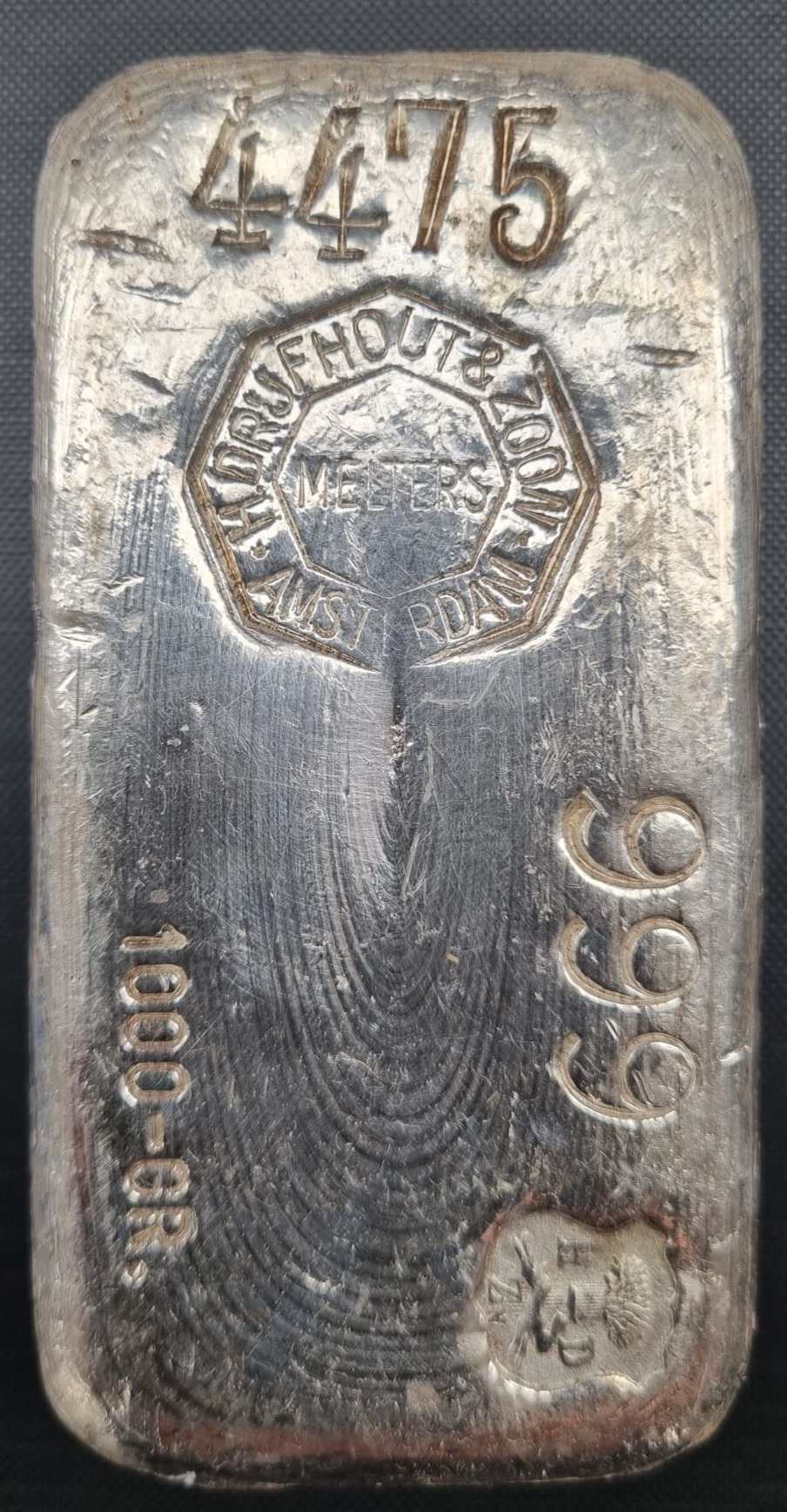 Drijfhout zilverbaar 1 kg front 101munten Drijfhout